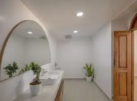 Luxurious bathroom with elegant sink and stylish mirror.